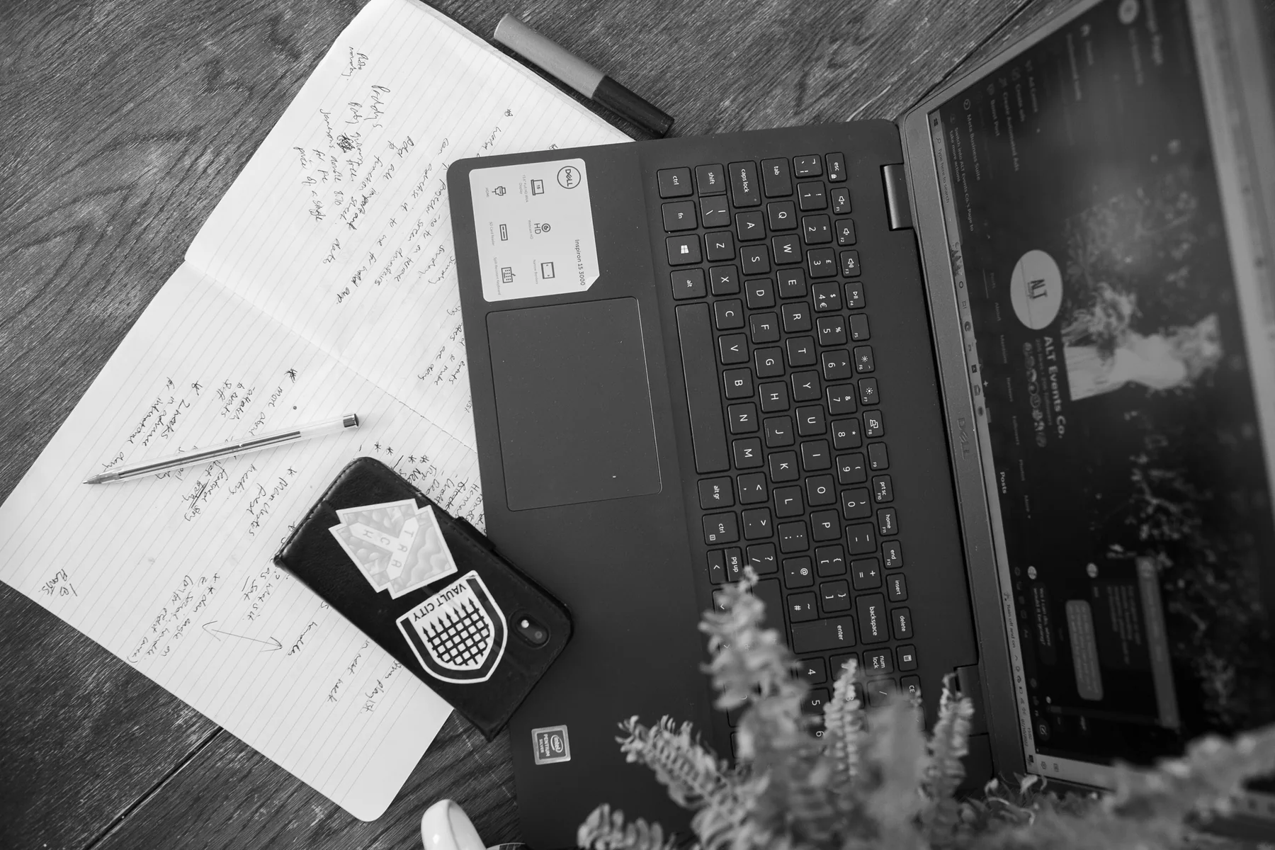 Beth’s wedding planning notes and laptop