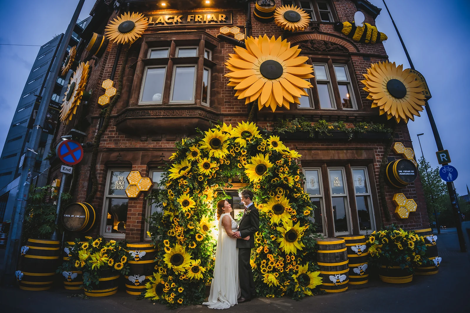 Couple beneath a spectacular sunflower display